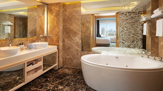 Spacious Bathtub and Vanity Area - Club One Bedroom Executive Suite