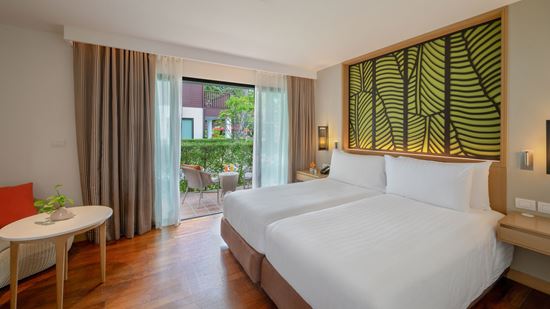รูปการตกแต่งภายในห้องพัก ดีลักซ์ ไทย วิลเลจ - โรงแรม อมารี เกาะสมุย